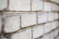 White brick wall with perspective as a background. Structure and texture of the brick wall. Old white brick wall background in per Royalty Free Stock Photo