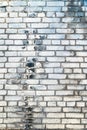 White brick wall texture background. Wall with blue, grey and black paint Royalty Free Stock Photo