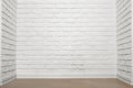 White brick wall with tiled floor, abstract background photo Royalty Free Stock Photo