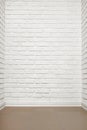 White brick wall with tiled floor, abstract background photo Royalty Free Stock Photo