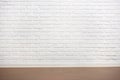 White brick wall with tiled floor, abstract background photo Royalty Free Stock Photo