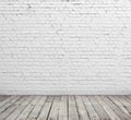 White brick wall and wood floor. Royalty Free Stock Photo