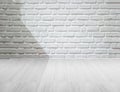 White brick wall and wooden floor with lighting and shadow Royalty Free Stock Photo