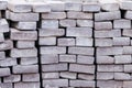 White bricks stacked on wooden pallets at a construction site Royalty Free Stock Photo