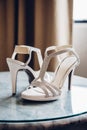 White Bride Shoes on Barble Table