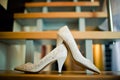 White bride shoes on the stairs, the background is blurred Royalty Free Stock Photo