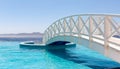 White bridge over infinity pool Royalty Free Stock Photo