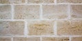 White brown brick stacked stone wall background horizontal in bordeaux Royalty Free Stock Photo
