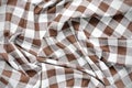 White and brown checked fabric