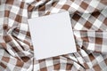 White and brown checked fabric