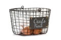 White and brown eggs in a wire basket Royalty Free Stock Photo