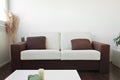 White and brown fabric sofa