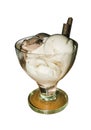 White and brown ice cream in a glass vase