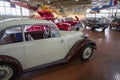 A white and brown 1938 Tatra T-57 B at Lane Motor Museum with the largest collection of vintage European cars, motorcycles