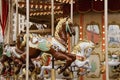 Children`s carousel with horses in an amusement park. Empty carousel on a clear sunny autumn day Royalty Free Stock Photo
