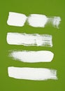 White brush strokes on green background Royalty Free Stock Photo