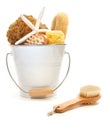 White bucket filled with sponges and scrub brushes Royalty Free Stock Photo
