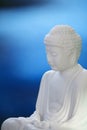 White Buddha on blue 02 Royalty Free Stock Photo