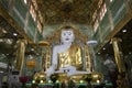 White buddha in a Burmese temple