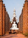 White Buddha in the middle of the pillar