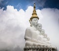 White Buddha Statue with cloud background