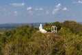 White Buddha statue opn top of a hill in Mihintale, Sri Lanka Royalty Free Stock Photo