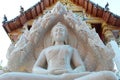 The white Buddha statue sheltered by naga hood Royalty Free Stock Photo