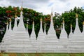 White buddhist pagodas with trees background, Myanmar