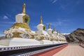 White buddhist stupa or pagoda in tibetan monastery near village Leh in ladakh, noth India Royalty Free Stock Photo