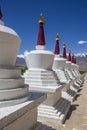 White buddhist stupa or pagoda in tibetan monastery near village Leh in ladakh, noth India Royalty Free Stock Photo