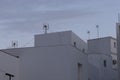 White building exterior facades at dusk