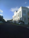 white building lit by the sun serene atmosphere