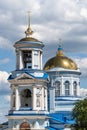 White building of Pokrovsky Cathedral with blue roof and golden domes. Temple of Voronezh Diocese of Russian Orthodox Church. Royalty Free Stock Photo