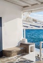 White building on the shore of the blue sea. Mykonos Royalty Free Stock Photo