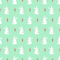 White bunny with carrot seamless pattern mint green background.