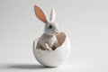 White bunny sitting inside a broken white egg. On light background. Banner with copy space. Ideal for Easter promotions Royalty Free Stock Photo