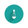 White Burning candle icon isolated with long shadow background. Cylindrical candle stick with burning flame. Green Royalty Free Stock Photo