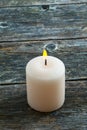 White burning candle on wooden background Royalty Free Stock Photo