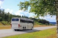 White Bus Travels in Summer