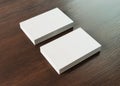 White business card pile on wood mockup 3d rendering