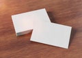 White business card pile on wood mockup 3d rendering