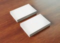 White business card pile on wood mockup 3d rendering