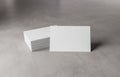 White business card stack on concrete desk 3D rendering Royalty Free Stock Photo