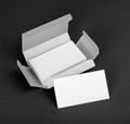 White business cards in the silvery box.