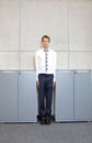 White business man standng straight between cabinets in office Royalty Free Stock Photo