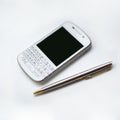 White business smartphone and pen