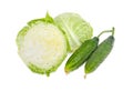 White cabbage cut in half and two cucumbers Royalty Free Stock Photo