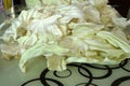 White cabbage cut into pieces on the counter Royalty Free Stock Photo