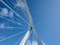 White cable-stayed architecture bridge Erasmusbrug over Nieuwe Maas river Rotterdam South Holland Netherlands blue sky