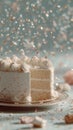 A white cake with a piece missing and sprinkles on top Royalty Free Stock Photo